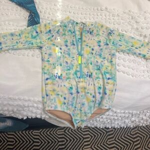 2 Long Sleeved Rash Guard Girls Swimsuits - very good used condition.